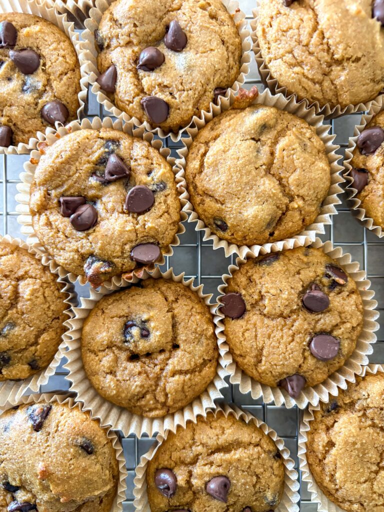 easy pumpkin chocolate chip muffins on a cooking rack