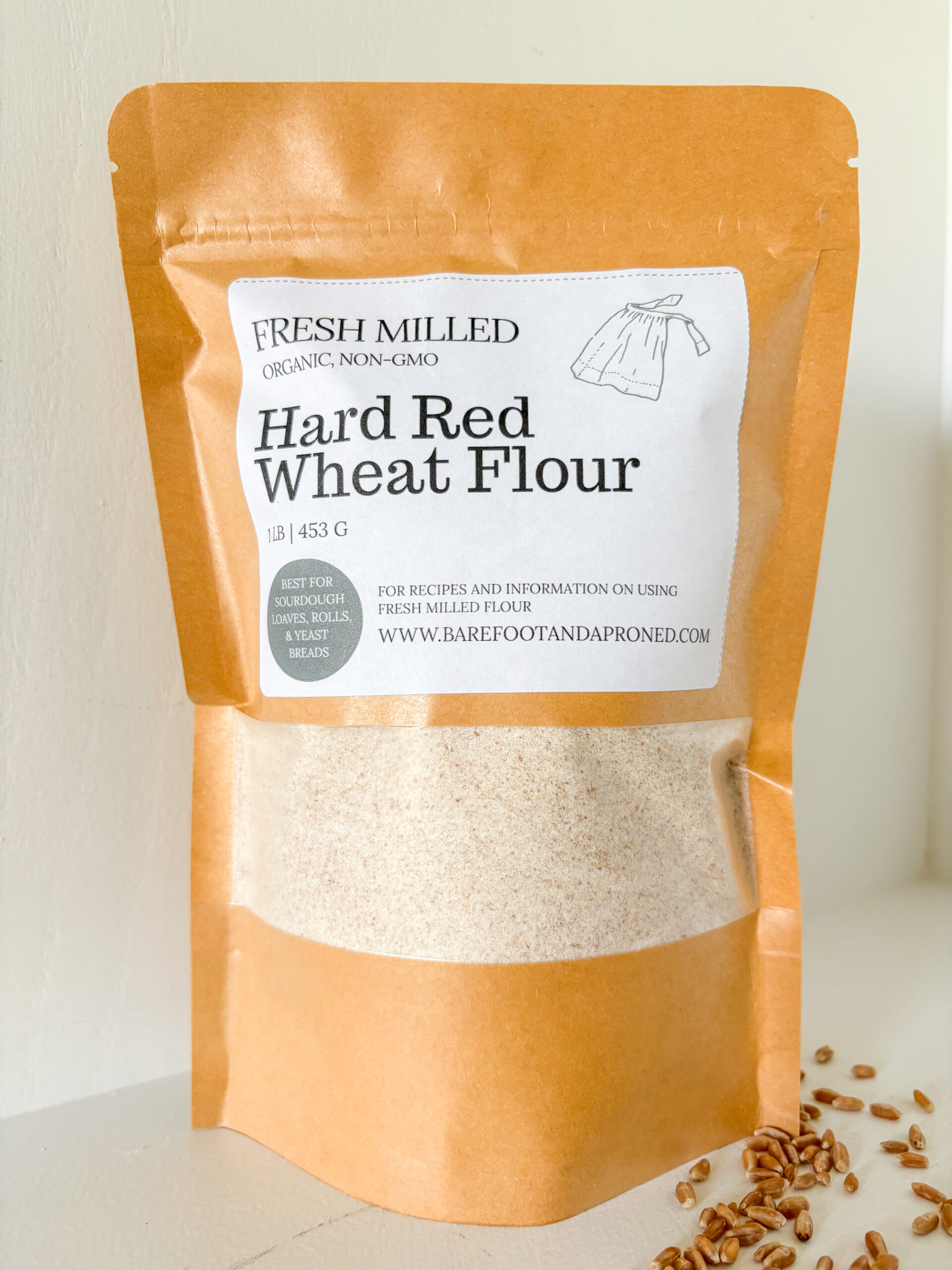 bag of freshly milled hard red wheat flour with wheat berries