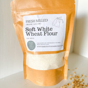 bag of fresh milled soft white wheat flour with wheat berries
