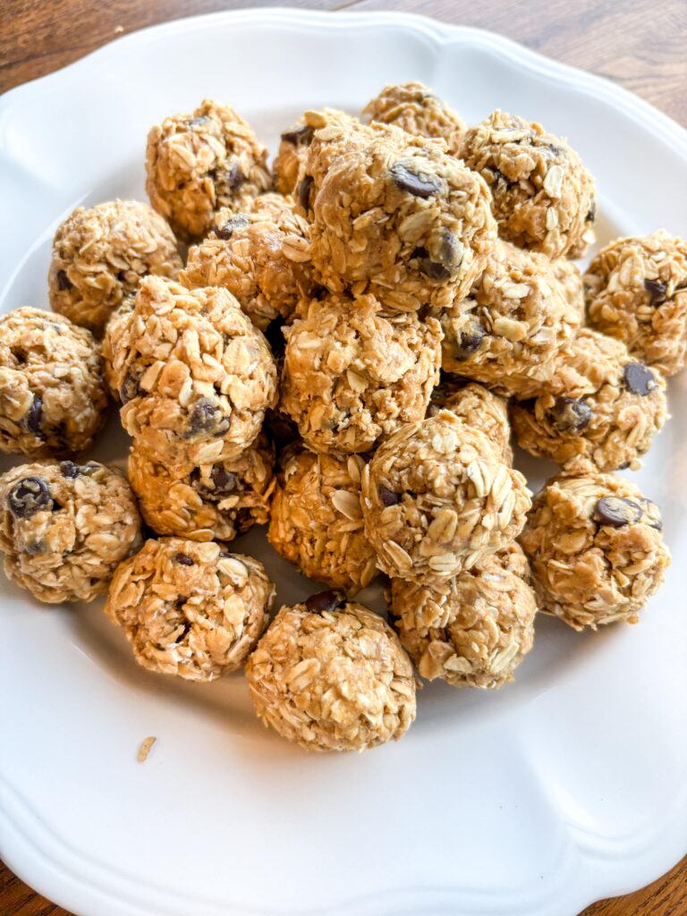 peanut butter energy balls in a white bowl